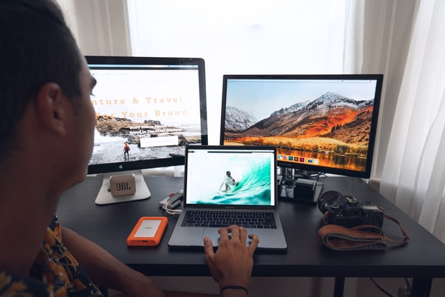 Man browsing the web for computer parts