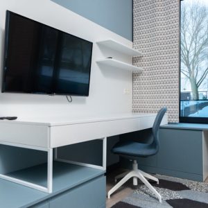 blue armless desk chair