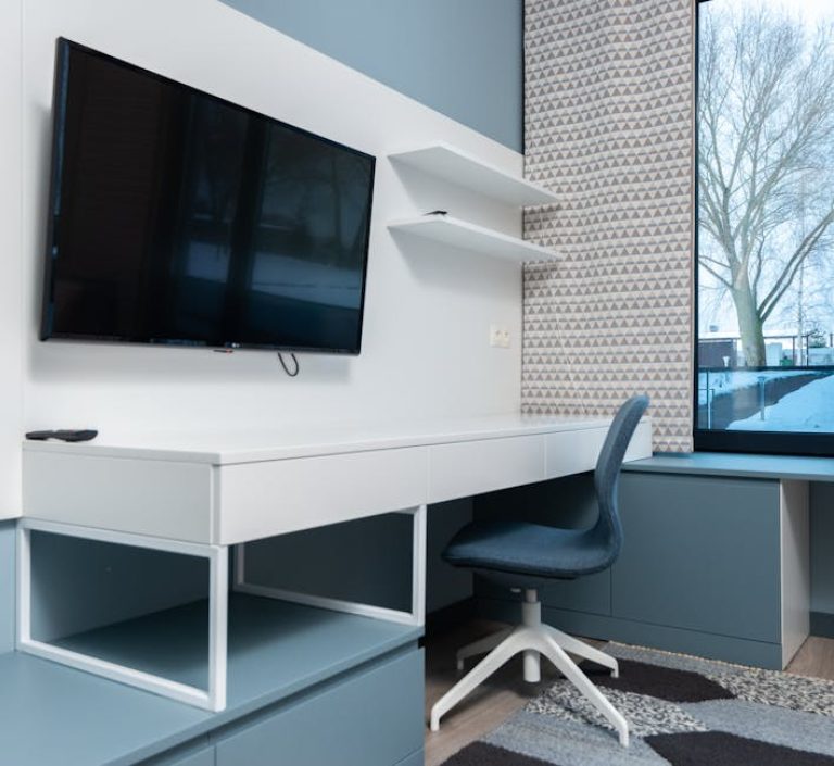 blue armless desk chair